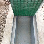 Moulded square mesh GRP grating in a Composite Cable Trench