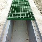 Moulded square mesh GRP grating in a Composite Cable Trench