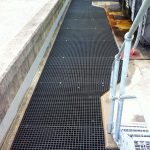 Moulded square mesh GRP grating on Pedestals